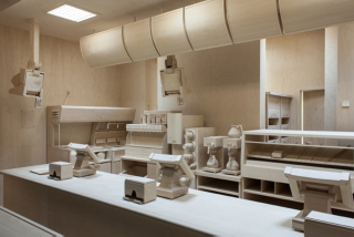 Illustration for article titled Someone made a full scale burger kitchen entirely carved in wood
